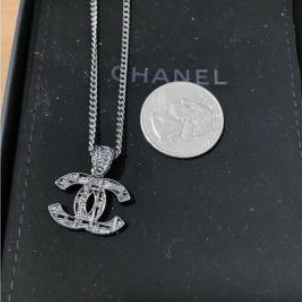 CHANEL Dazzling Silver Logo Necklace